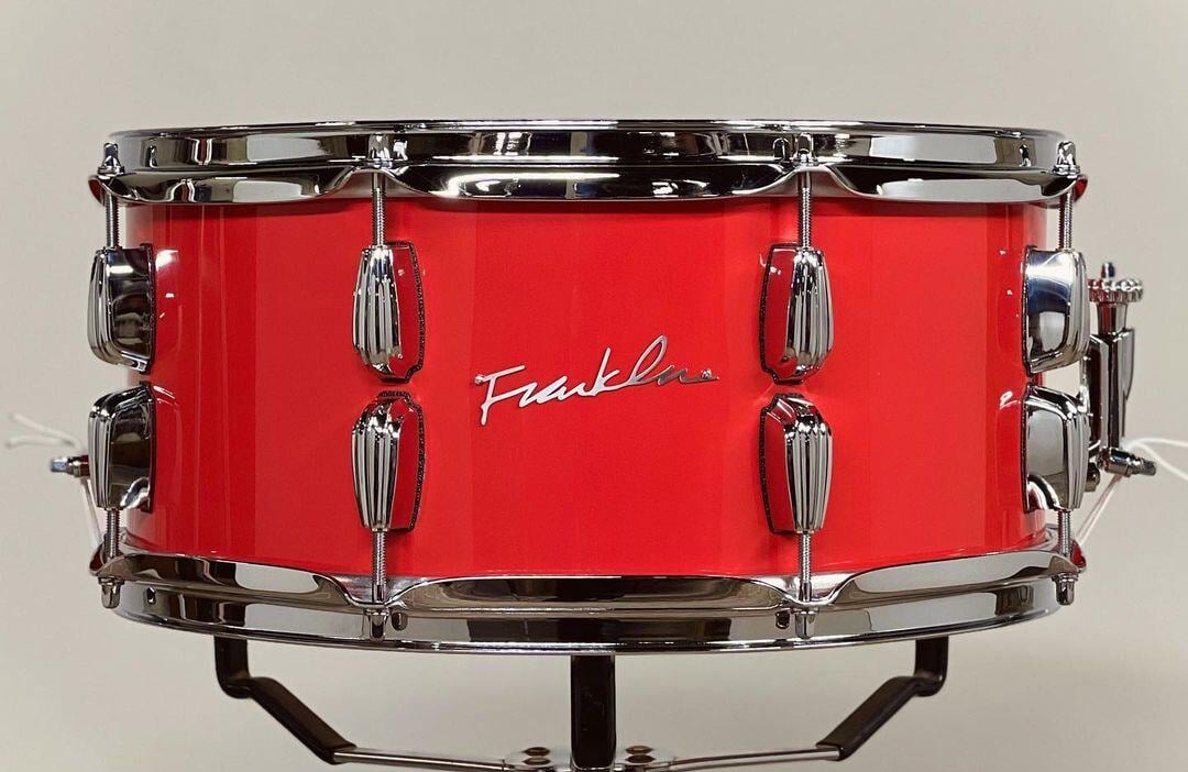Franklin Copper Snare in 6.5x14 with custom red gloss lacquer finish, centered lugs, and triple-flange hoops. 