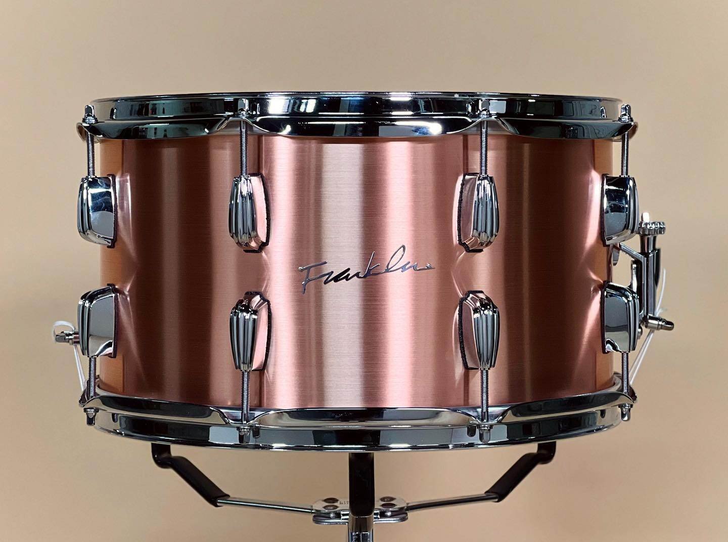 Franklin Copper Snare with brushed finish in 8x14 with stacked lugs and triple flange hoops.