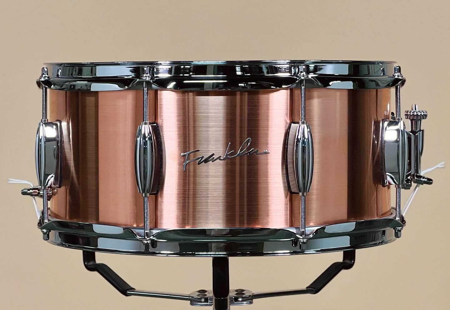 Franklin Copper Snare with brushed finish in 6.5x14 with centered lugs and triple flange hoops.